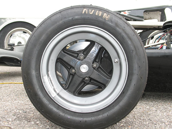 Brabham style 4-spoke magnesium wheels.