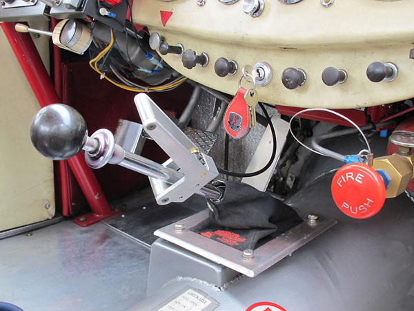 Hand-operated throttle mechanism to help him match engine-transmission revs.