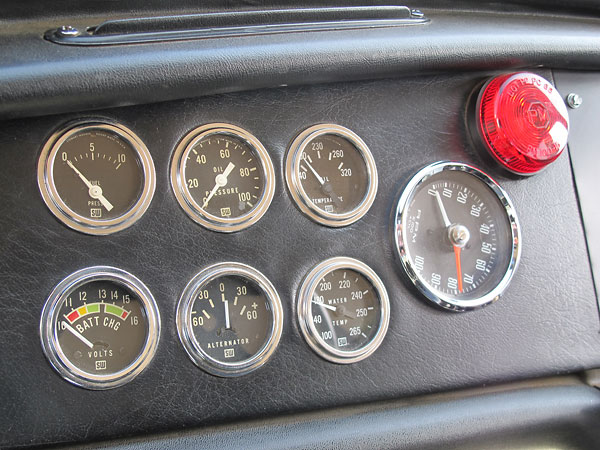 Stewart Warner gauges: fuel pressure, oil pressure, oil temp, voltmeter, ammeter, and water temp.