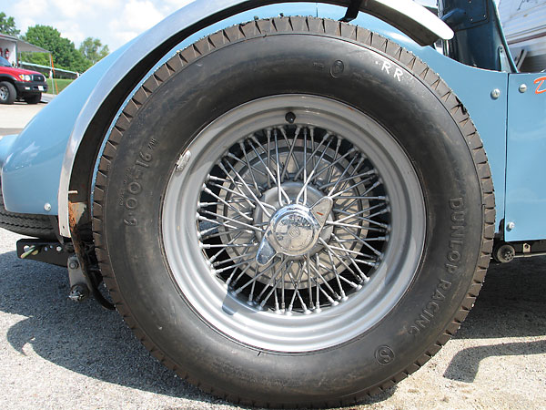 Dunlop Racing 6.00x16 tires on Dunlop sixty spoke sixteen inch wire wheels.