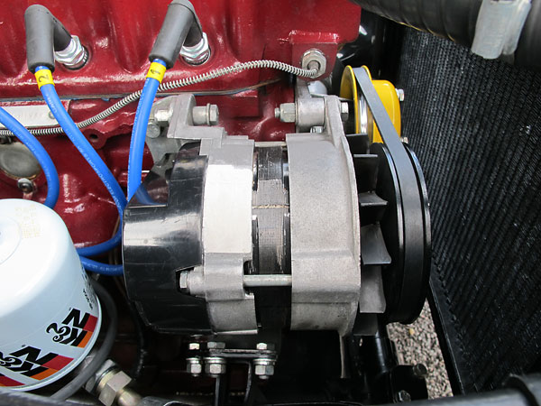 Lucas alternator with oversize pulley.