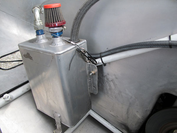 Custom fabricated aluminum overflow/breather tank.