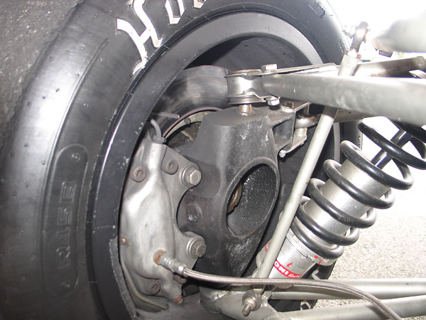 Magnesium uprights and Girling disc brakes carry over from T190.