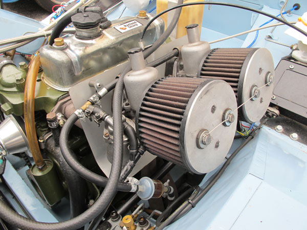 Dual S.U. HS4 (1.5 inch) carburetors.