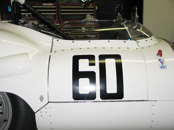 Wrap-around Perspex (acrylic) windscreens became a common feature of sports racing cars of this era.
