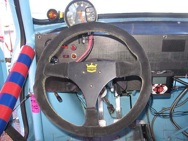 Personal suede covered ergonomic steering wheel.