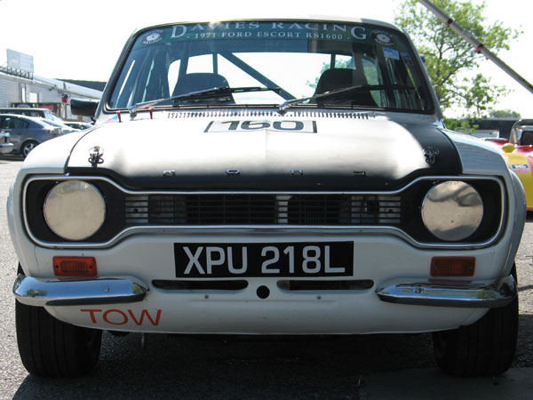 Ford Escort Mk1: Coke bottle styling and a dog bone grille.
