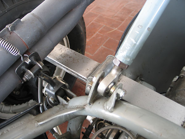 Another view of the muffler bracket, and also the roll-over hoop brace lower attachment point.