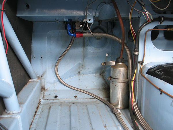 Cooling system overflow tank, fuel supply line (3/8 inch) and the oil hose to the Accusump (1/2 inch).