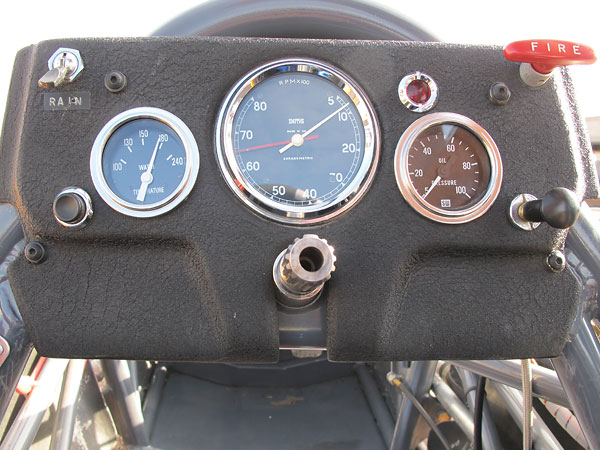 Stewart Warner coolant temperature gauge (100-240F) and oil pressure gauge (5-100psi).