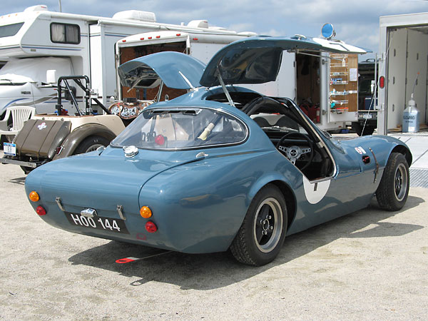 Marcos gull-wing doors, rear three-quarter view.