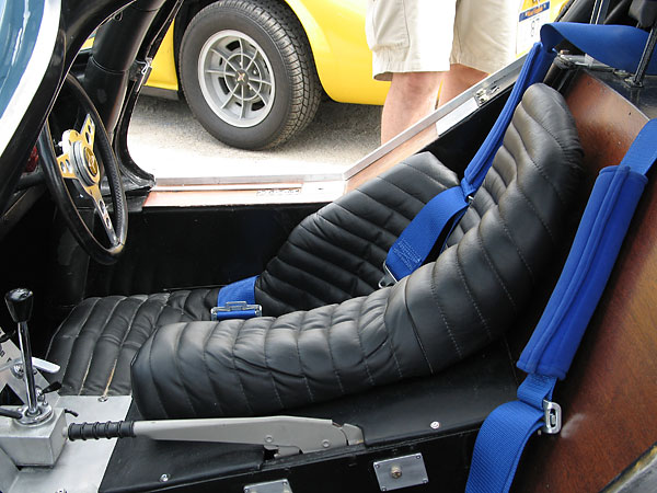 Custom leather-upholstered racing seat.