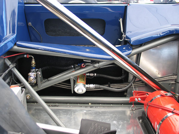 Center: Facet Bendix-style electric fuel pump. Left: Holley adjustable fuel pressure regulator.