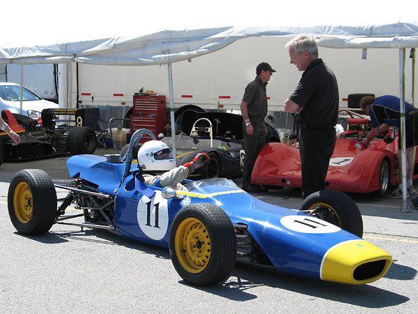 In the background here you can glimpse Bernard's other racecar: a lovely blue Elva MkVII.