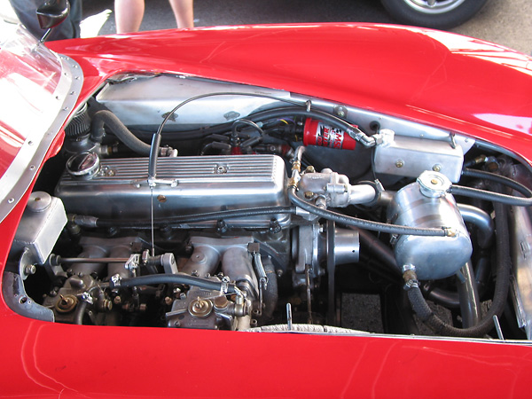 The Triumph TR3 engine has been shifted about five inches rearward relative to the TR3 frame.