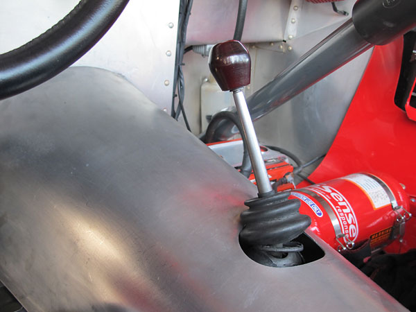 Triumph TR3 shifter lever, rotated 180 degrees for better driver comfort in the Devin cockpit.