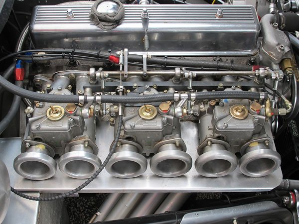 Triple Weber 45DCOE carburetors.