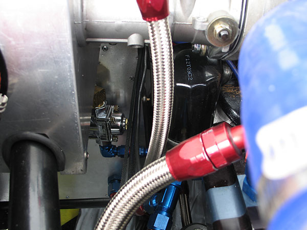 Fuel pressure regulator and remote oil filter.