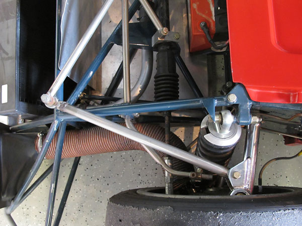 To take advantage of new Firestone tires, Derek Bennett redesigned the B21 front suspension.