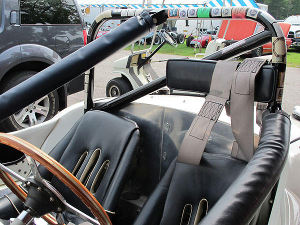 Headrest and roll hoop padding detail. Note Dzus fasteners on the cockpit's back wall.