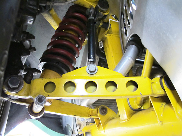 Castor and camber  can be adjusted by shimming the upper control arm mounting points.