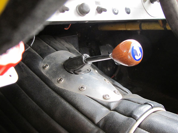 Triumph logo shifter knob connects the driver to a TR4 four speed.