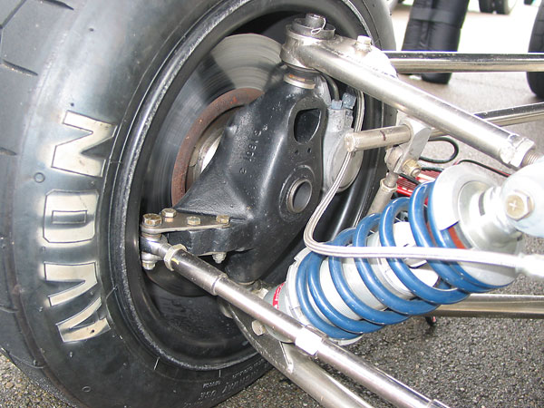 Brabham proprietary magnesium uprights (marked C 1801 2).