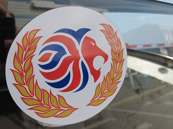 Stylized lion / union jack logo sticker.