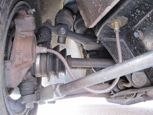 Front suspension and brakes are entirely stock, except for braided stainless steel brake hoses.