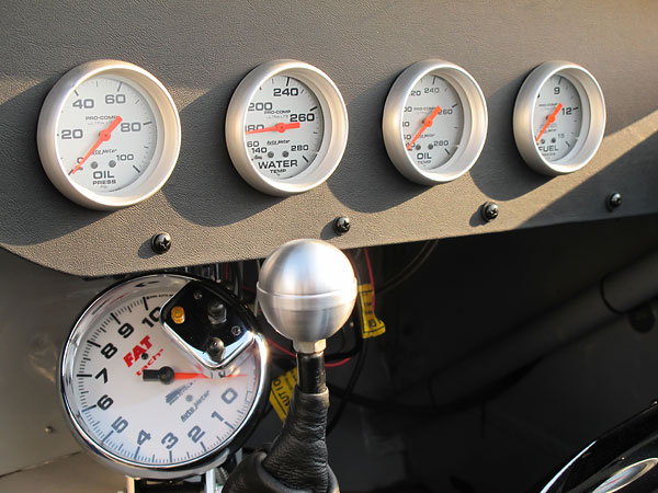 AutoMeter FAST Tach tachometer (0-10000rpm), and AutoMeter Pro-Comp Ultra Lite