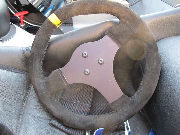 Suede covered ergonomic steering wheel.