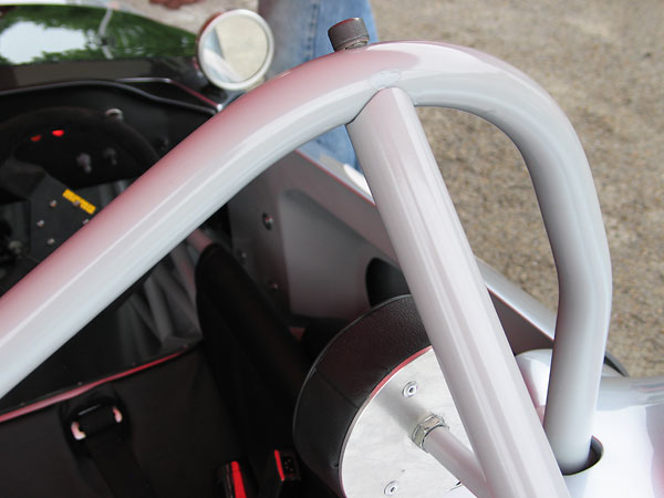 The rearward roll hoop brace is detachable so that the whole rear body section can be removed.