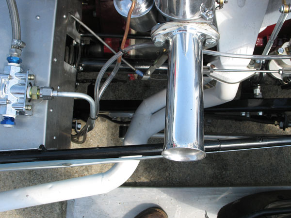 Solt two-piece iron exhaust manifolds flow into a fabricated (2-into-1) secondary collector.