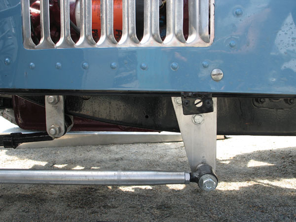 Trailing links from the front axle improve steering precision.