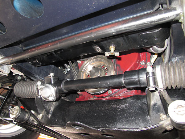 Unmodified front crossmember. Moss quick ratio steering rack.