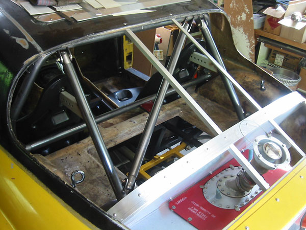 The eyebolts seen here will come in handy later, when the body is lowered onto the frame.