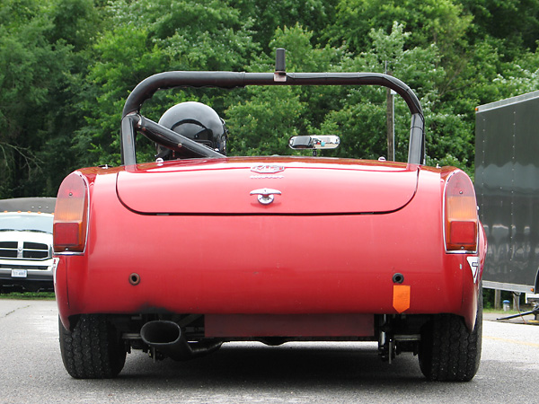 Tail light lenses are from a later model (1970 or later) MG Midget.