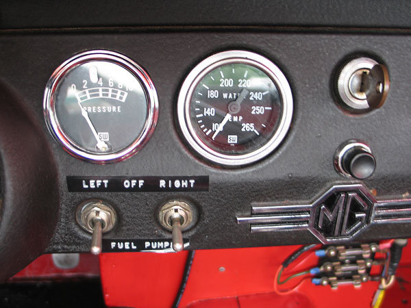 Stewart Warner fuel pressure (0-10psi) and water temperature (100-265F) gauges.