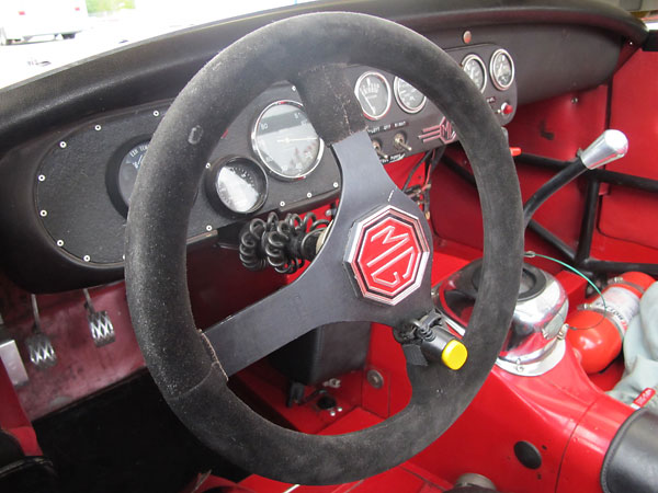 It's a dished steering wheel, and it's reverse mounted to provide a more comfortable reach for Derek.