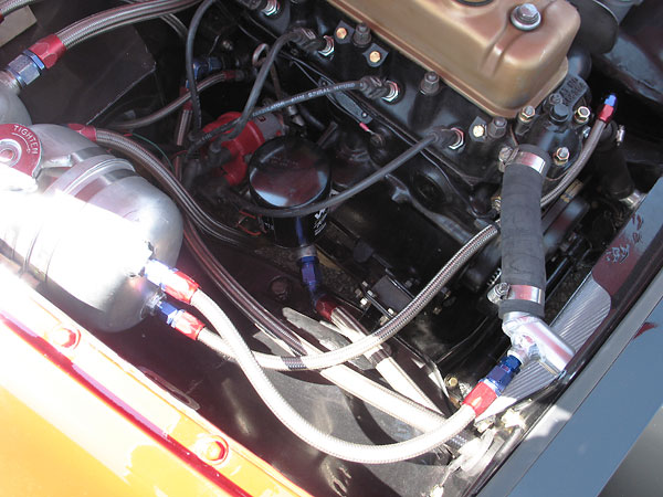 Hoses to and from the header tank are small to reduce flow, because any coolant that passes through them is bypassing the radiator core.