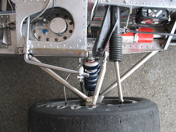 Refueling the Lola T190 requires removing the fiberglass bodywork.