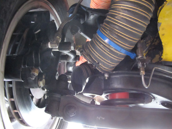 Large aluminum dual piston brake calipers and vented rotors.