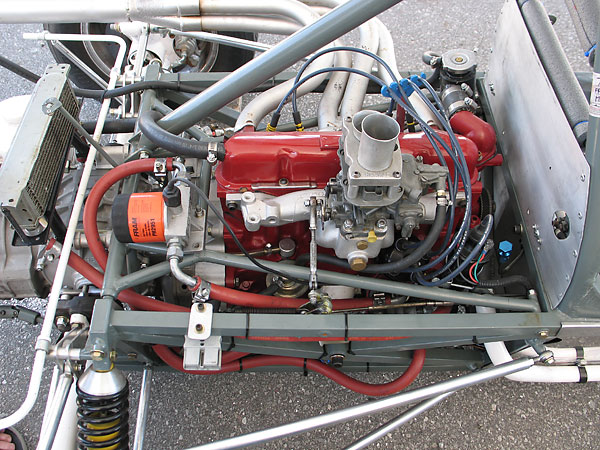 Weber 32/36 DGV carburetor on an original Ford intake manifold, as mandated by class rules.