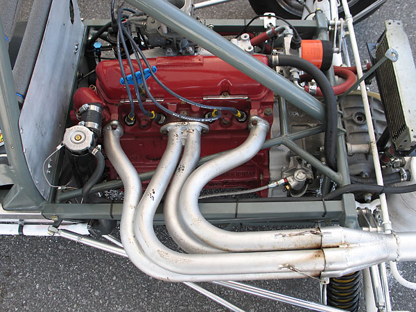 4-into-1 exhaust header. Girling clutch slave cylinder.