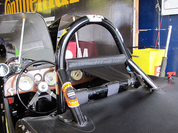 A neat custom-fitted tonneau cover smoothes airflow over the cockpit, and protects it from the elements.