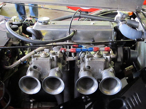 Dual Weber DCOE carburetors in lieu of original S.U. H4 (1.5 inch) carbs.