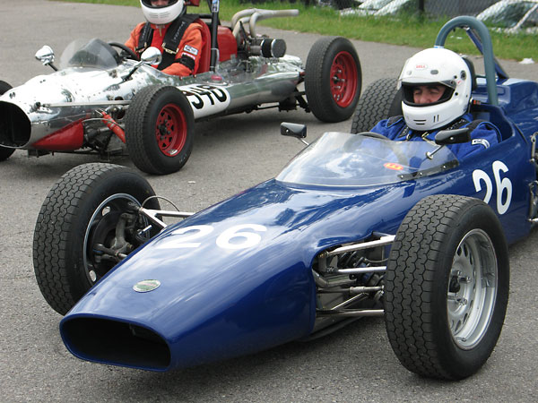 (It must be hard to concentrate with rather odd homebuilt racecar parked next to your Merlyn.)