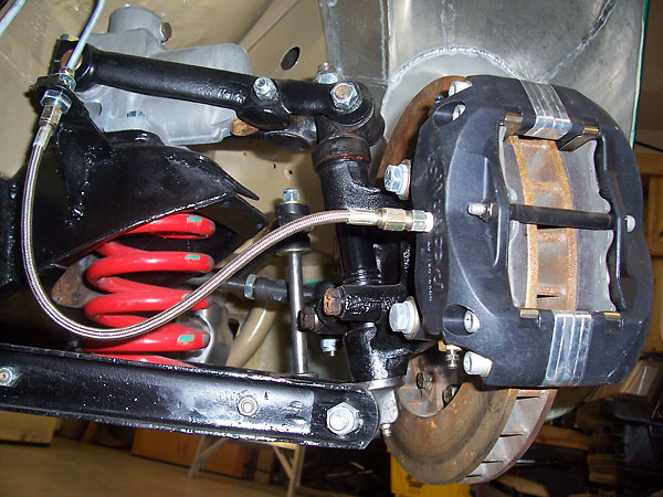 Lowered racing springs from Moss Motors. Standard/rebuilt spindles. Stock lever shocks.