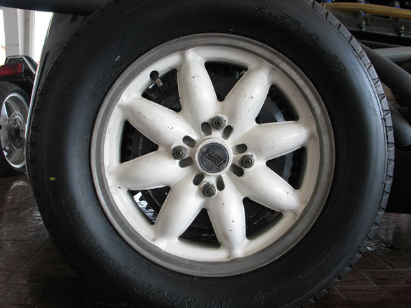 Dunlop CR48 (R6 tread pattern) 4.50L-15 front and CR65 (R7 tread pattern) 5.50L-15 rear tires.