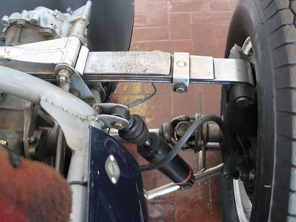 As with the front suspension, leafsprings are called on to locate the upper ends of the hub carriers.